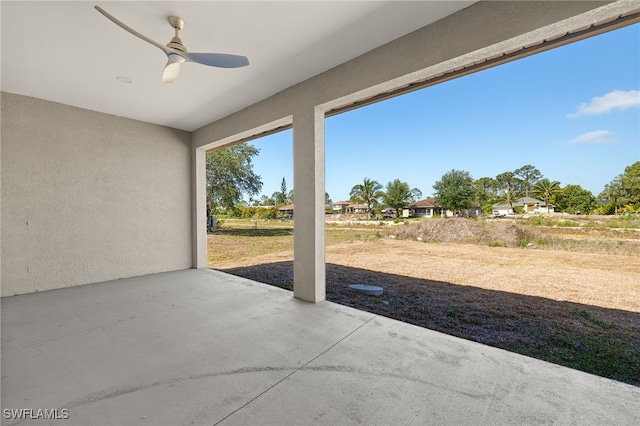 1043 Albert Ave, Lehigh Acres, FL 33971 - view of patio / terrace with a ceiling fan