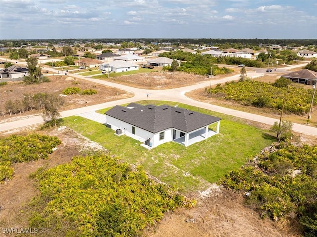 drone / aerial view featuring a residential view