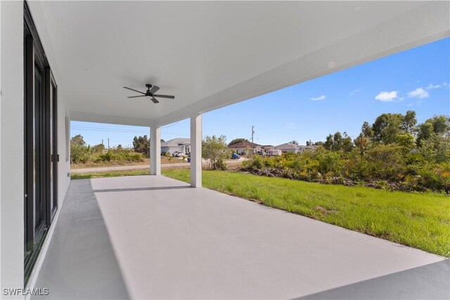 view of patio featuring a ceiling fan