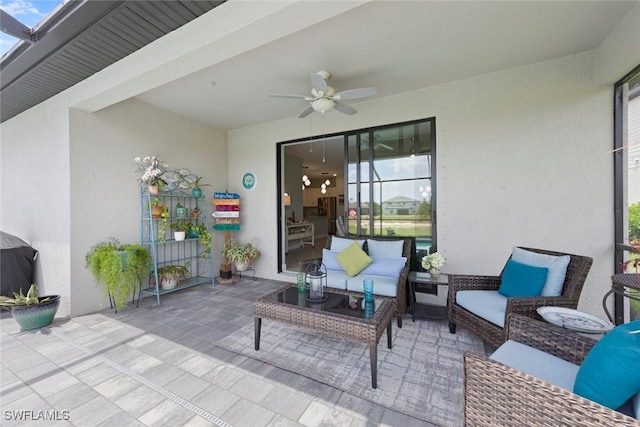 view of patio / terrace with ceiling fan and outdoor lounge area