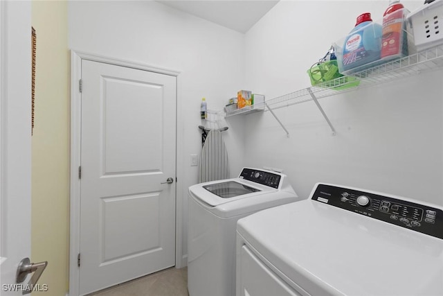 laundry room with laundry area and independent washer and dryer