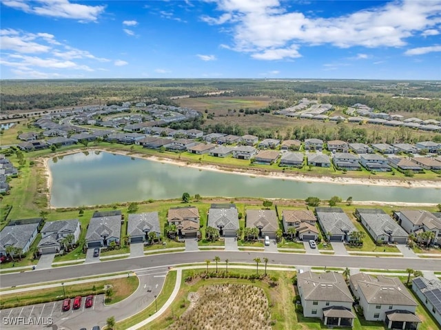 bird's eye view with a water view and a residential view