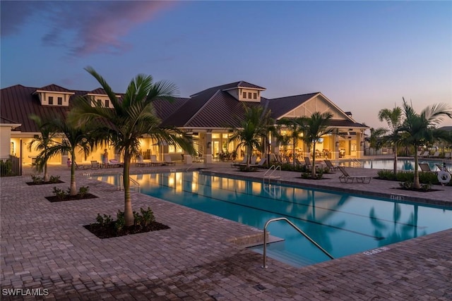 pool with a patio area