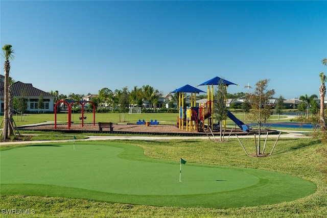 community playground featuring a yard