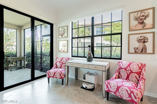 2173 Frangipani Cir Unit 102, Naples, FL 34120 - sitting room featuring crown molding and tile patterned floors