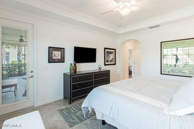 2173 Frangipani Cir Unit 102, Naples, FL 34120 - bedroom with arched walkways, crown molding, access to outside, ceiling fan, and baseboards