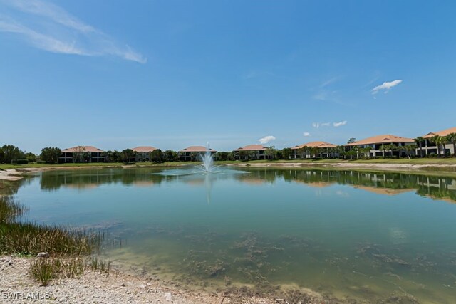 2173 Frangipani Cir Unit 102, Naples, FL 34120 - water view with nearby suburban area