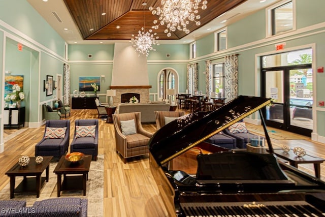 2173 Frangipani Cir Unit 102, Naples, FL 34120 - lobby with a towering ceiling, wood ceiling, and recessed lighting
