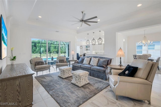 28616 Wharton Dr, Bonita Springs, FL 34135 - living room featuring ceiling fan, a chandelier, and recessed lighting