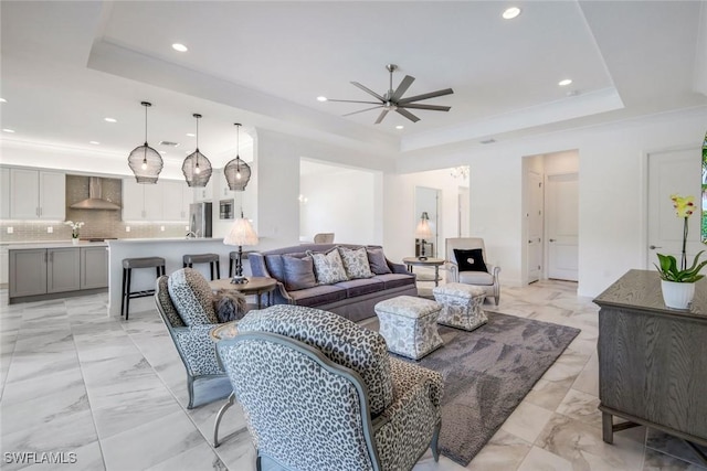 28616 Wharton Dr, Bonita Springs, FL 34135 - living room with a raised ceiling, a ceiling fan, recessed lighting, and light marble finish floors