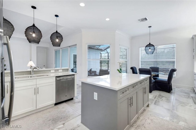 28616 Wharton Dr, Bonita Springs, FL 34135 - kitchen featuring stainless steel dishwasher, a sink, light marble finish floors, crown molding, and light countertops