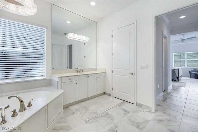 28616 Wharton Dr, Bonita Springs, FL 34135 - bathroom featuring recessed lighting, a garden tub, vanity, a ceiling fan, and marble finish floors