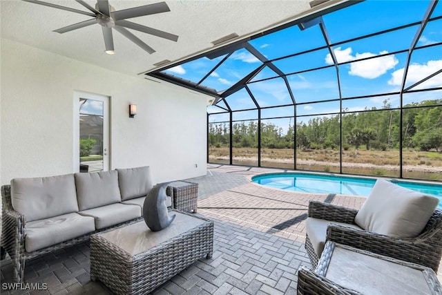 28616 Wharton Dr, Bonita Springs, FL 34135 - outdoor pool featuring a ceiling fan, a patio area, an outdoor living space, and a lanai