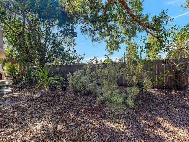 view of yard with fence