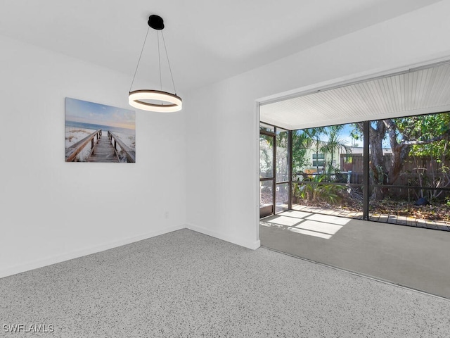 empty room featuring speckled floor