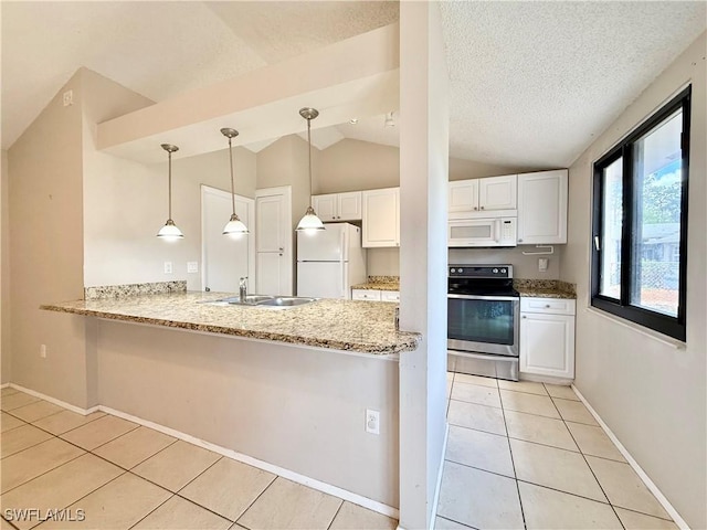 kitchen featuring a peninsula, white appliances, white cabinetry, a sink, and light tile patterned floors