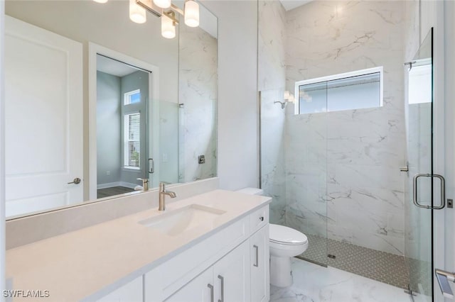 full bath with vanity, toilet, a marble finish shower, and marble finish floor