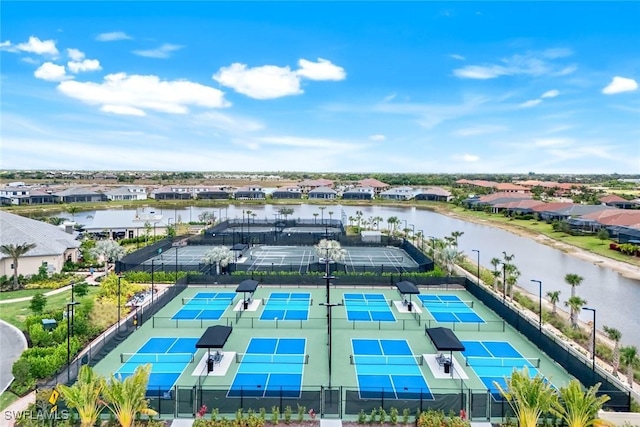 aerial view featuring a water view and a residential view