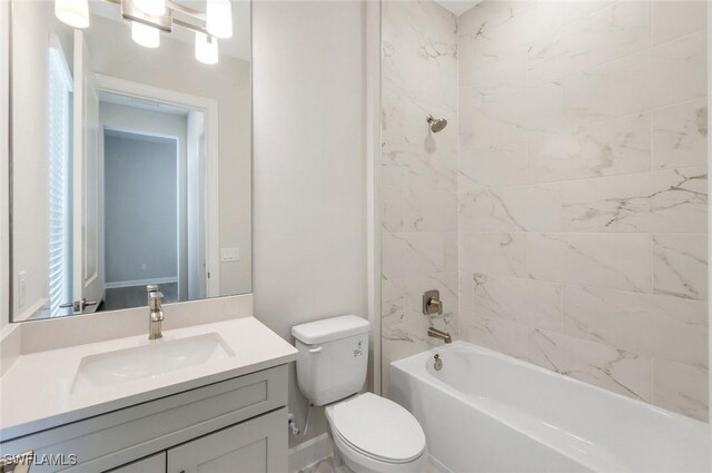 full bathroom featuring bathtub / shower combination, toilet, and vanity