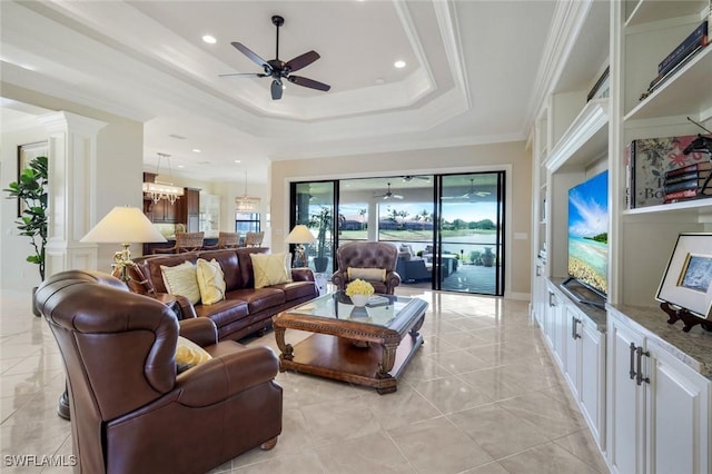 living area featuring ceiling fan, a raised ceiling, recessed lighting, and crown molding