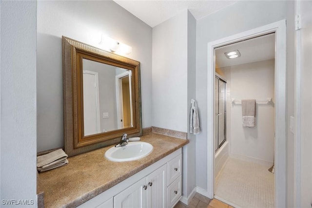 180 Seaview Ct Unit 814, Marco Island, FL 34145 - bathroom featuring enclosed tub / shower combo and vanity