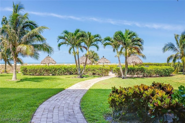 180 Seaview Ct Unit 814, Marco Island, FL 34145 - surrounding community featuring a lawn