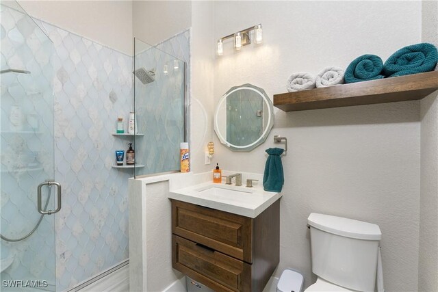 1255 Eider Ct, Punta Gorda, FL 33950 - bathroom featuring toilet, vanity, and a shower stall