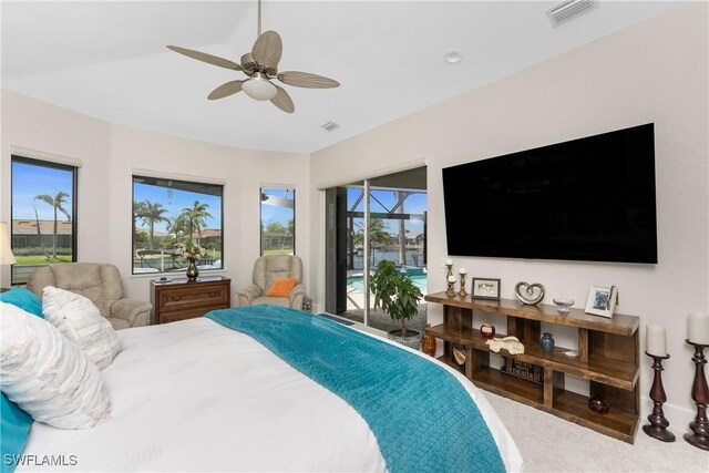 1255 Eider Ct, Punta Gorda, FL 33950 - carpeted bedroom with access to exterior and ceiling fan
