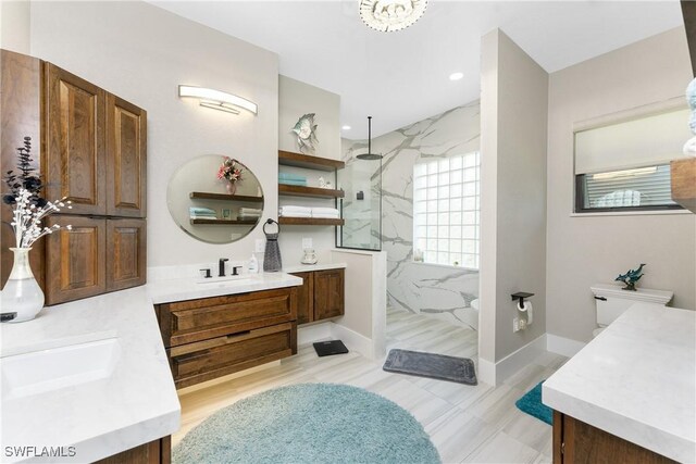 1255 Eider Ct, Punta Gorda, FL 33950 - bathroom with vanity, a marble finish shower, and recessed lighting