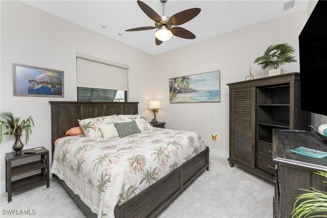 1255 Eider Ct, Punta Gorda, FL 33950 - bedroom with light colored carpet, baseboards, and a ceiling fan