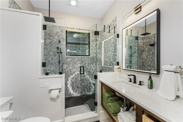 1255 Eider Ct, Punta Gorda, FL 33950 - bathroom featuring toilet, a stall shower, and vanity
