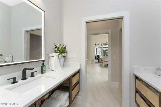 1255 Eider Ct, Punta Gorda, FL 33950 - bathroom with vanity and baseboards