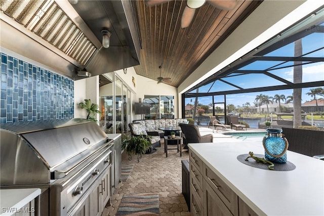 1255 Eider Ct, Punta Gorda, FL 33950 - view of patio / terrace with a ceiling fan, an outdoor living space, an outdoor pool, glass enclosure, and outdoor dining area