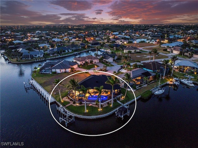 1255 Eider Ct, Punta Gorda, FL 33950 - aerial view at dusk of a water view and a residential view
