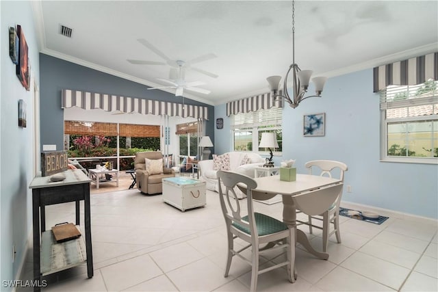 4752 Maupiti Way, Naples, FL 34119 - dining space with ornamental molding, light tile patterned floors, a chandelier, a ceiling fan, and baseboards