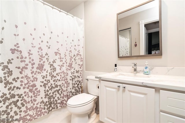4752 Maupiti Way, Naples, FL 34119 - full bath with toilet, vanity, and a shower with curtain