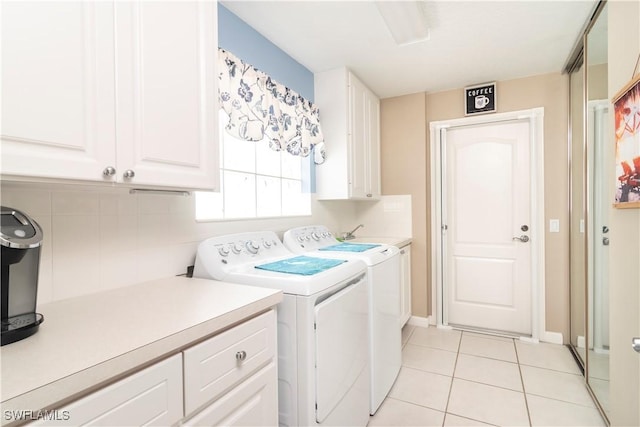 4752 Maupiti Way, Naples, FL 34119 - clothes washing area with cabinet space, washer and dryer, and light tile patterned floors