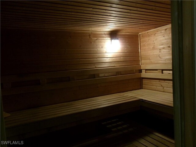 sauna / steam room featuring wood ceiling and wood finished floors