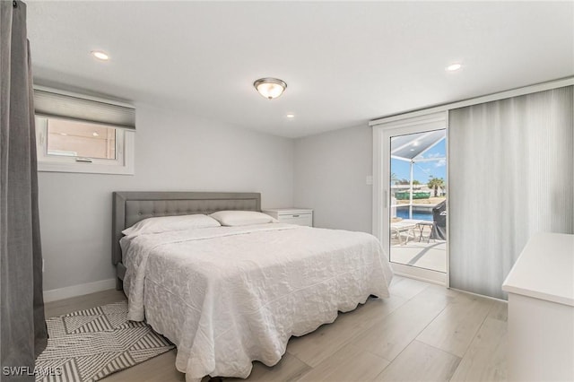 420 Donora Blvd, Fort Myers Beach, FL 33931 - bedroom featuring light wood-style flooring, access to outside, recessed lighting, and baseboards