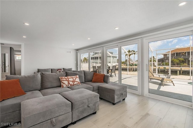 420 Donora Blvd, Fort Myers Beach, FL 33931 - living room featuring recessed lighting and light wood finished floors