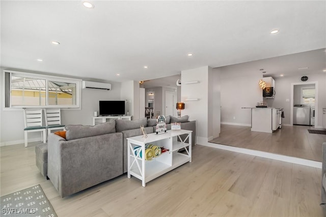 420 Donora Blvd, Fort Myers Beach, FL 33931 - living area featuring a wall mounted AC, light wood finished floors, baseboards, and recessed lighting