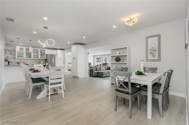 420 Donora Blvd, Fort Myers Beach, FL 33931 - dining area with light wood-style flooring, recessed lighting, a chandelier, and baseboards