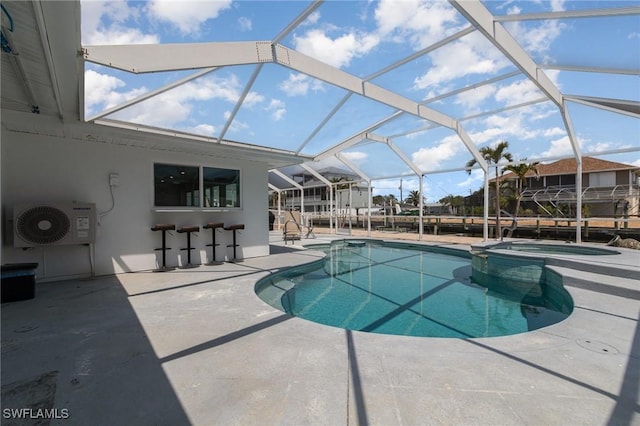 420 Donora Blvd, Fort Myers Beach, FL 33931 - view of pool with a patio, ac unit, a pool with connected hot tub, and glass enclosure
