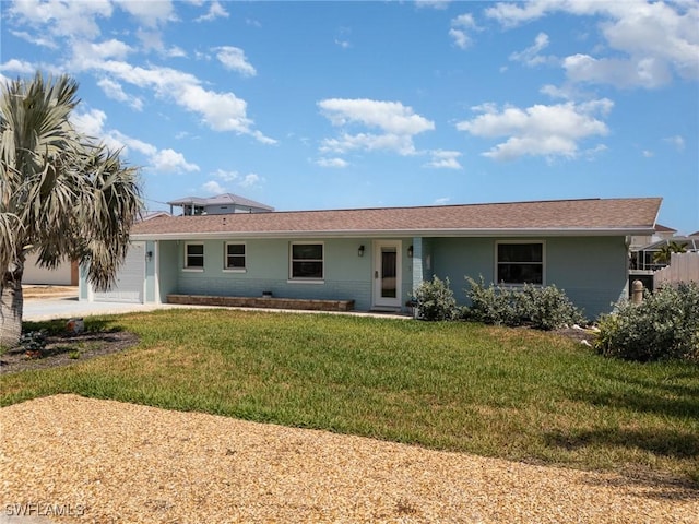 420 Donora Blvd, Fort Myers Beach, FL 33931 - single story home with a garage and a front lawn