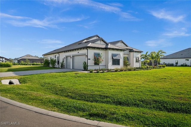 19570 Panther Island Blvd, Estero, FL 33928 - single story home featuring driveway, a garage, and a front lawn