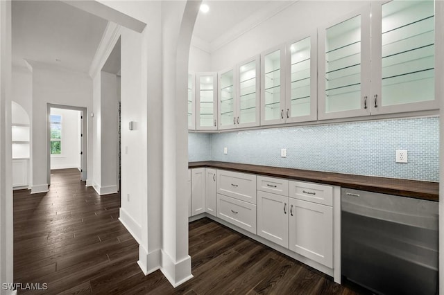 19570 Panther Island Blvd, Estero, FL 33928 - bar featuring dishwasher, ornamental molding, decorative backsplash, dark wood-type flooring, and baseboards