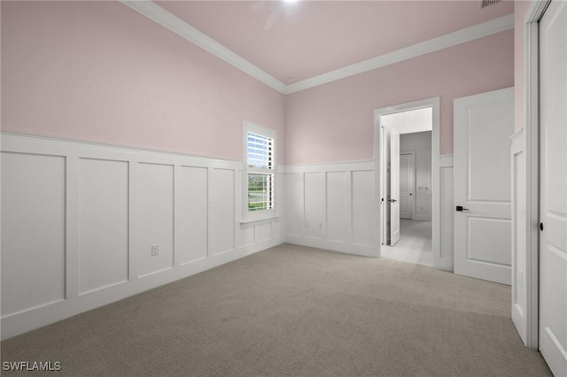 19570 Panther Island Blvd, Estero, FL 33928 - carpeted spare room with a decorative wall, crown molding, and wainscoting