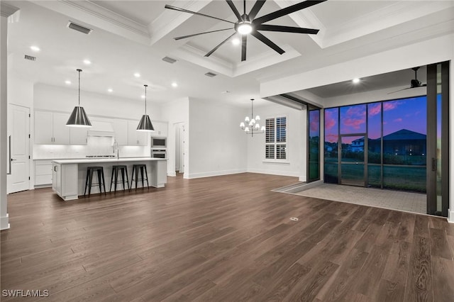 19570 Panther Island Blvd, Estero, FL 33928 - unfurnished living room featuring coffered ceiling, a chandelier, ceiling fan, recessed lighting, and dark wood-style floors