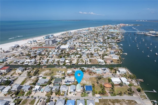 birds eye view of property featuring a water view and a residential view