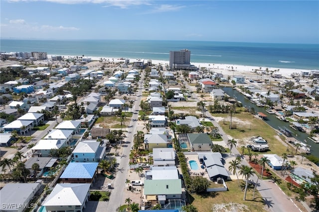 birds eye view of property featuring a water view and a residential view